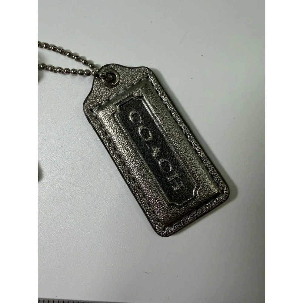 Coach bag charm